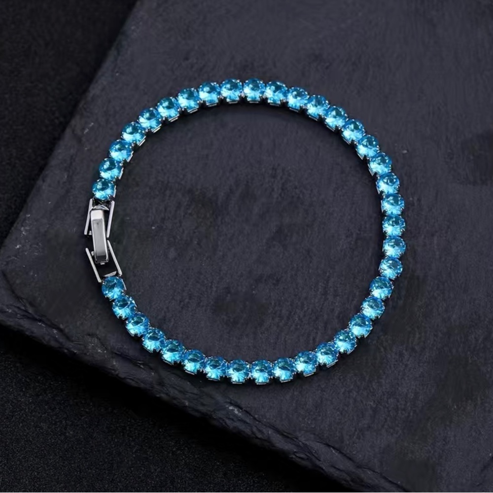 Beautiful Round Blue Topaz Bracelet In White Gold - Picture 4 of 12